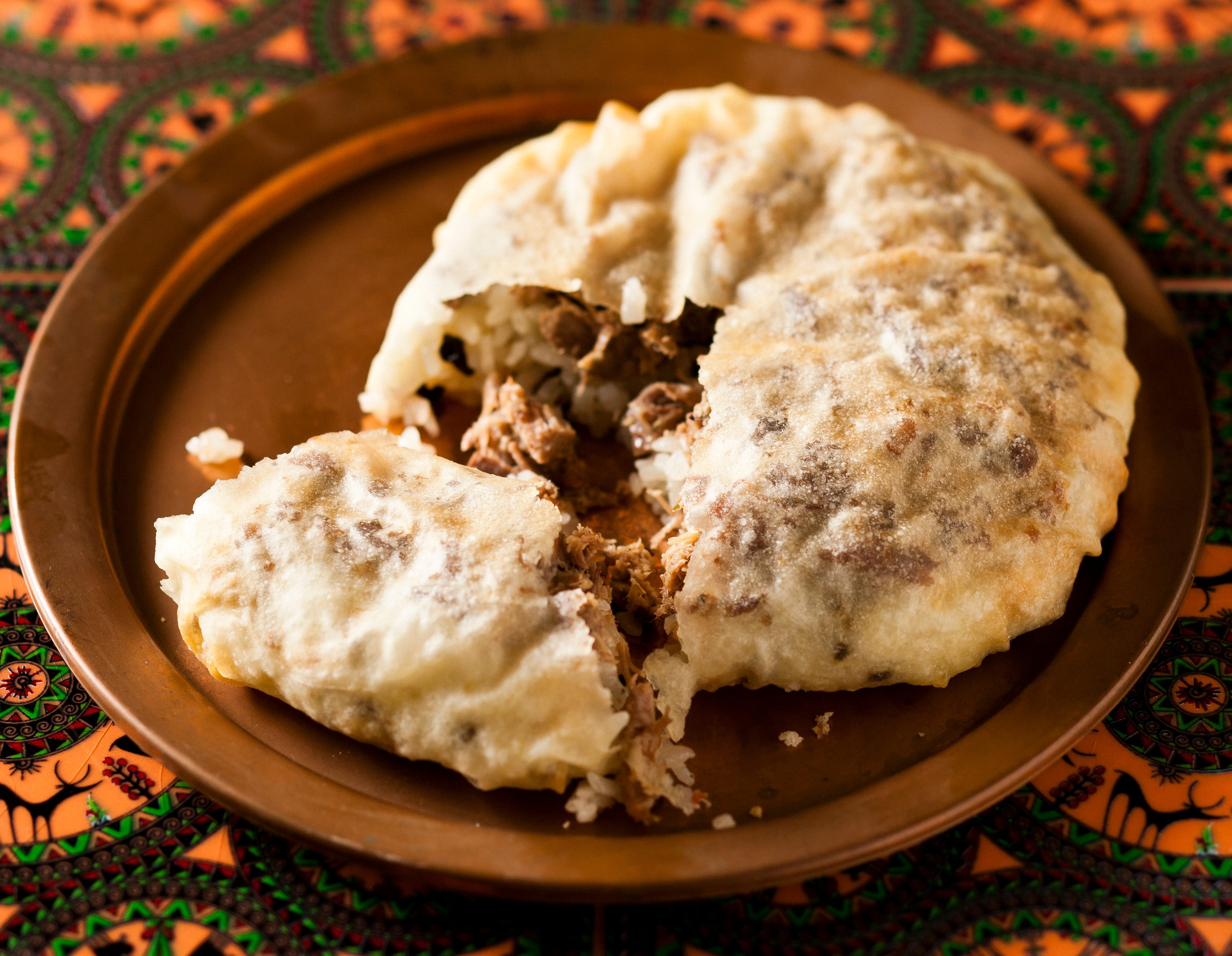 Crunchy flatbread envelops slow-roasted goose and almond pilaf in this 1539 dish.