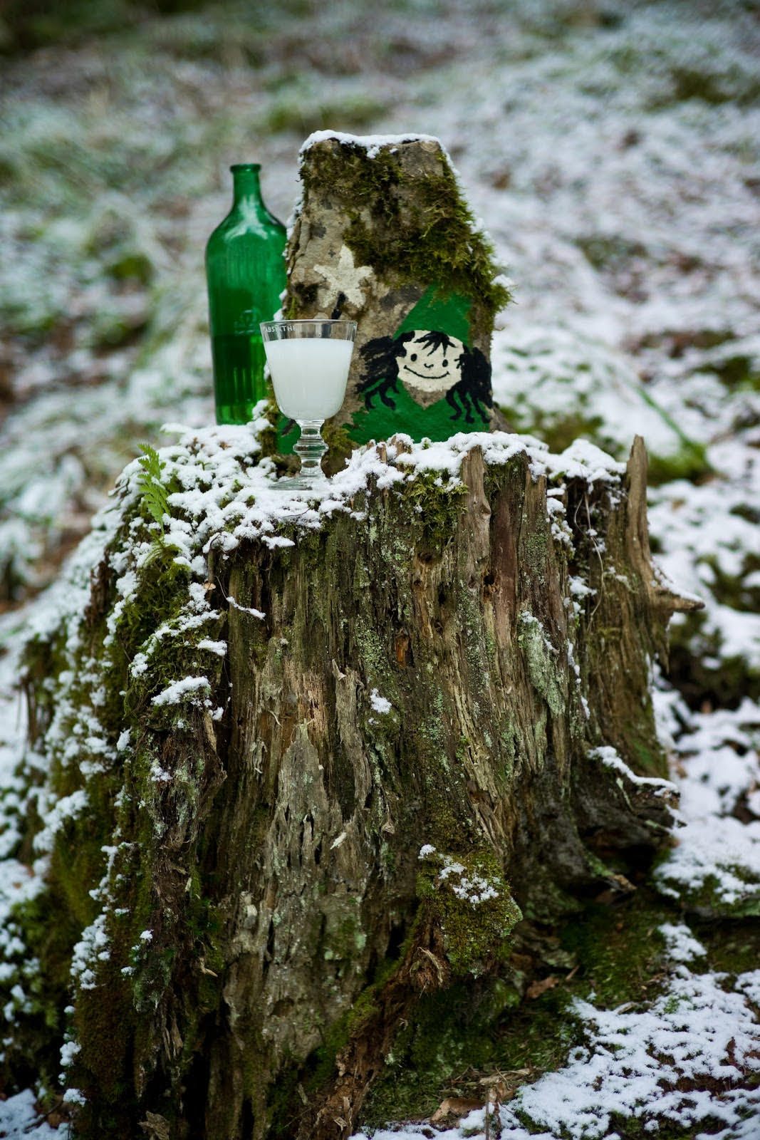 Hikers are invited to drink from the communal bottles tucked away in the woods. 