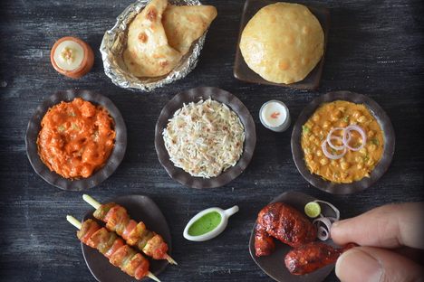 A selection of tiny, inedible Punjabi food.