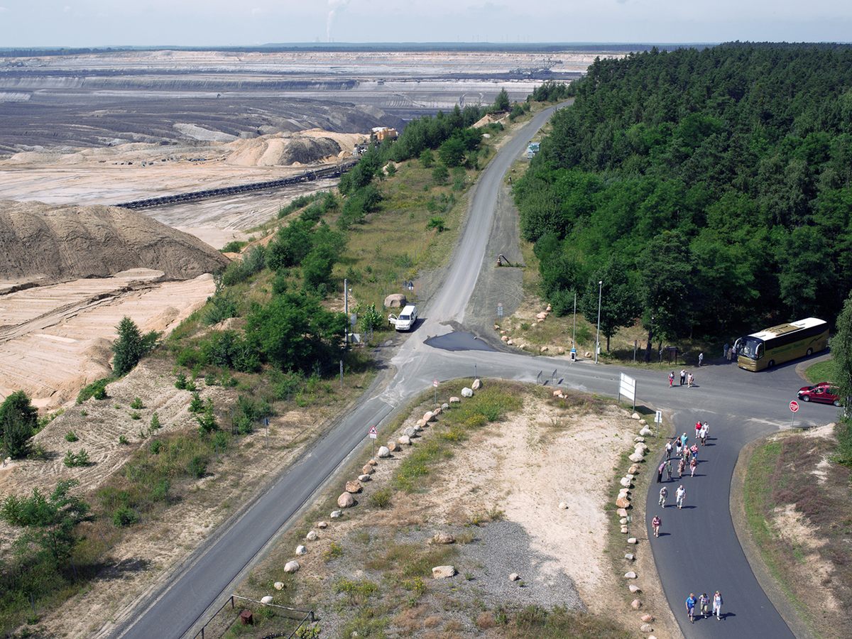 Tourists can explore the area—including the open-cast mines at left—on guided bus tours.