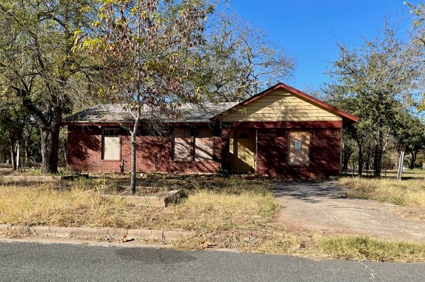 A condemned Onion Creek house awaiting demolition