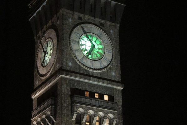 The Emerson-Bromo Tower at night, lit from within. 