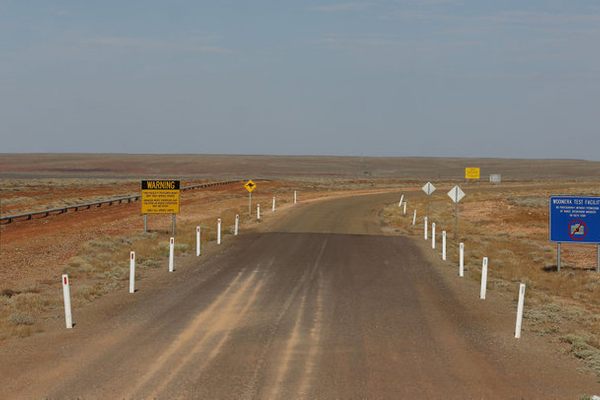 Warning signs at the entrance of the Woomera test facility.