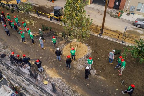 Volunteers gather to help transform the Rail Park into an urban green space. 