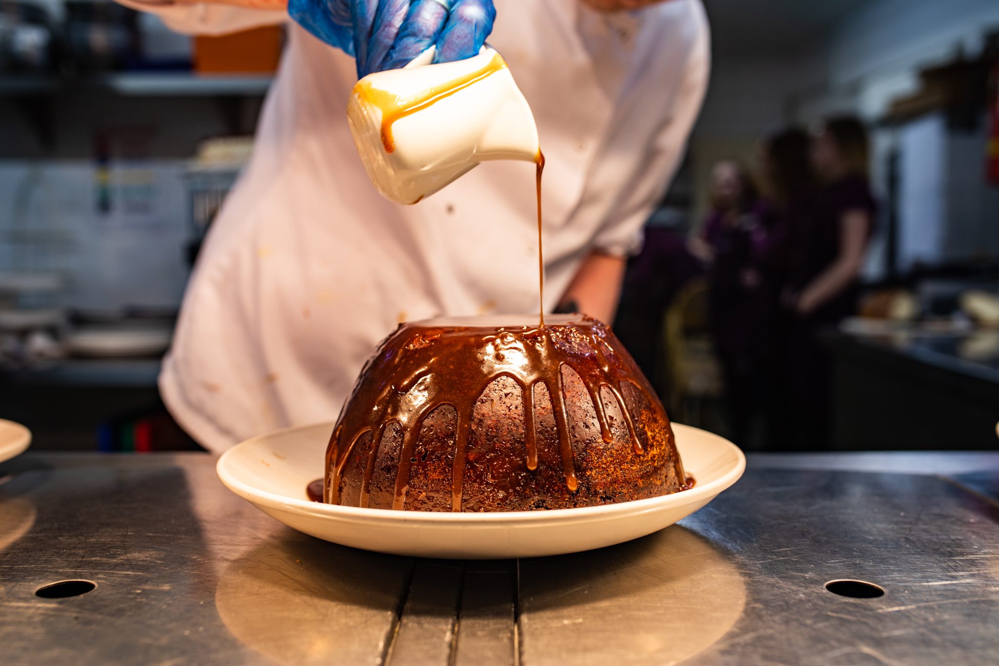 A sticky toffee pudding, getting ready for its parade.