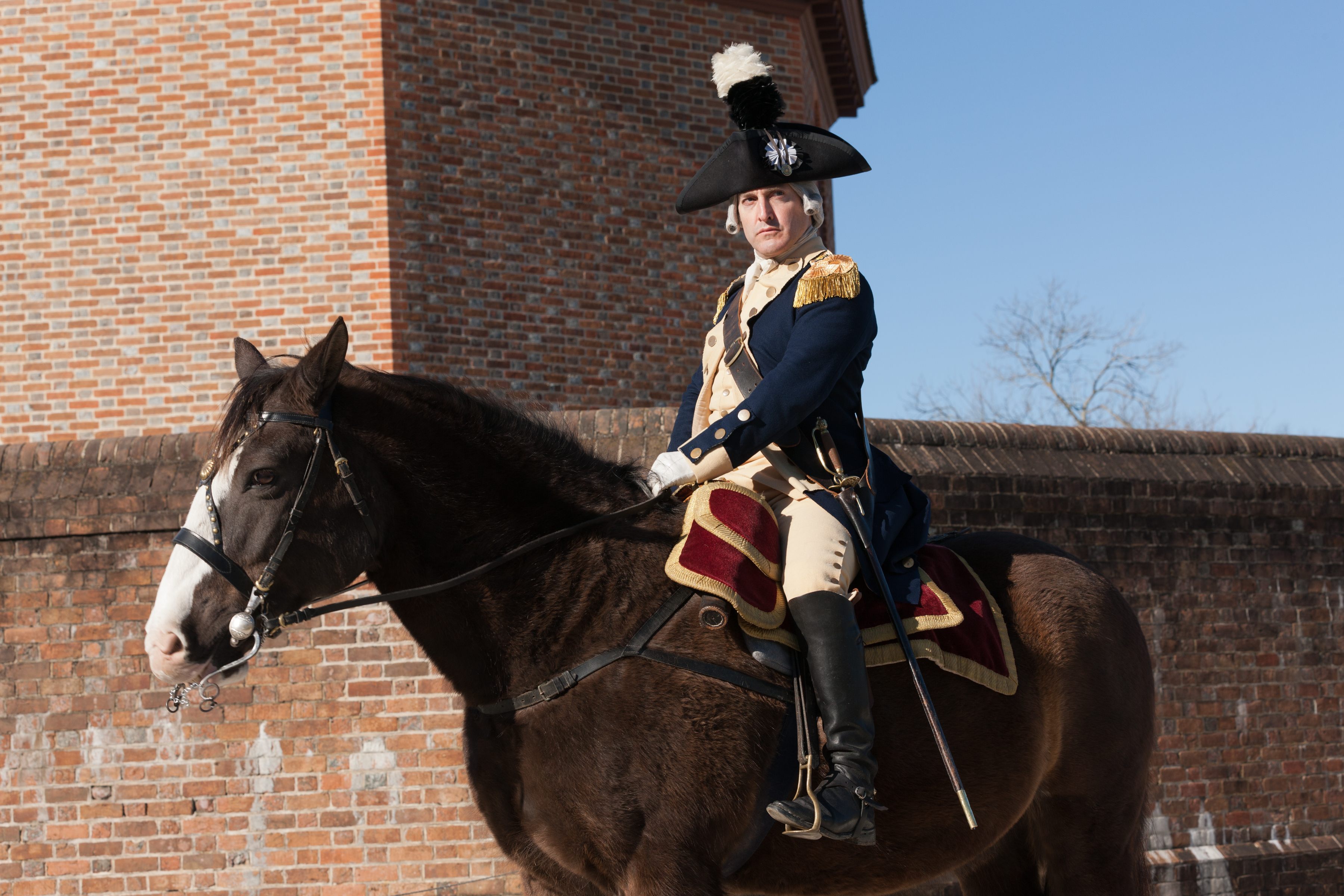 An interpreter on horseback, at Colonial Williamsburg.
