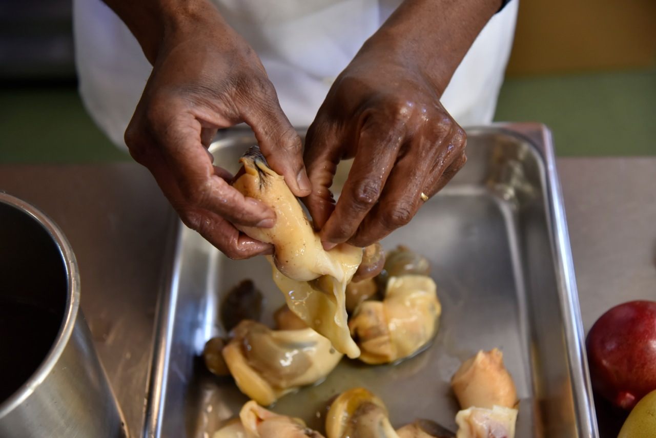 Chef Deon preparing conch. 