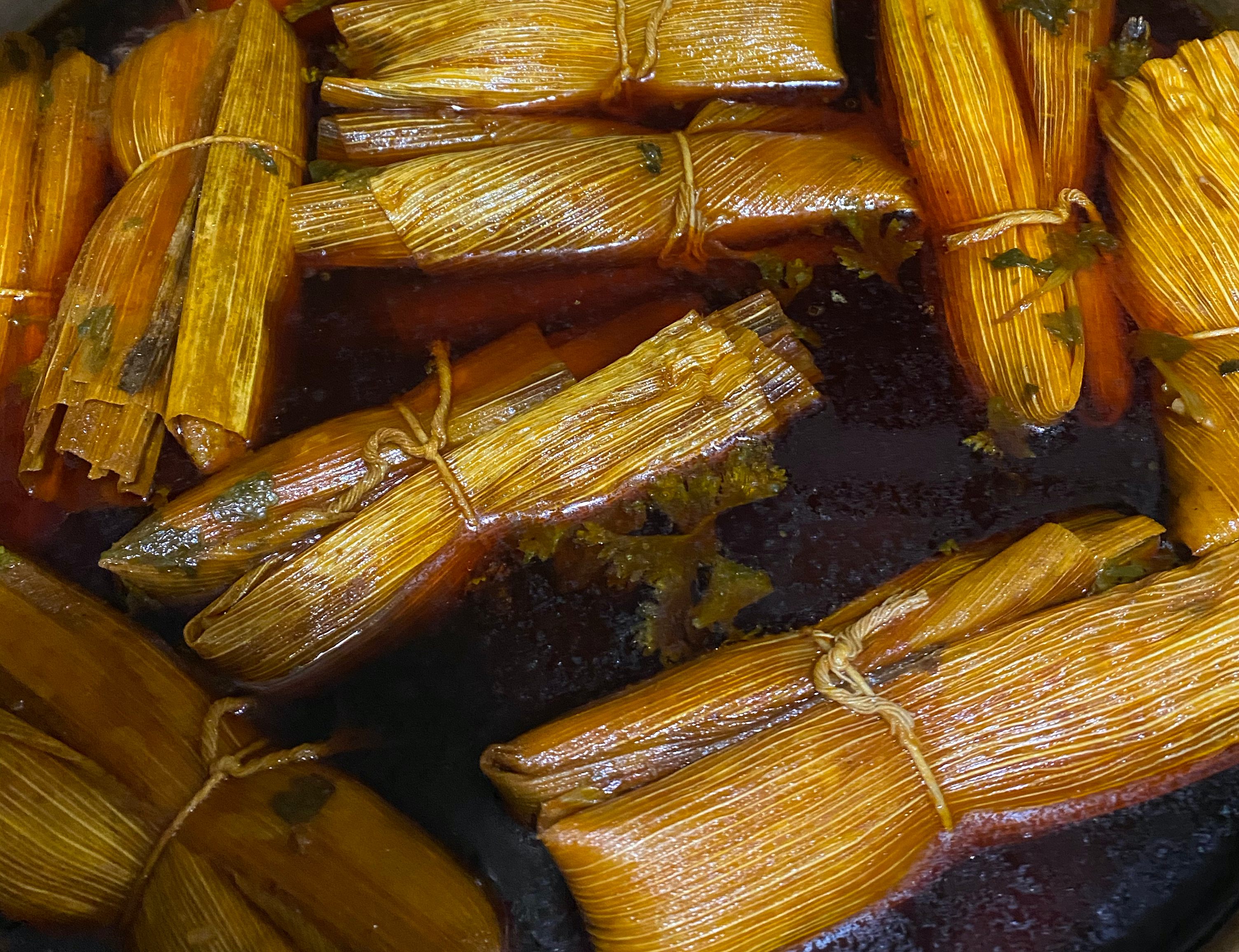 Sledge serves his tamales in an herb-flecked, spicy broth.