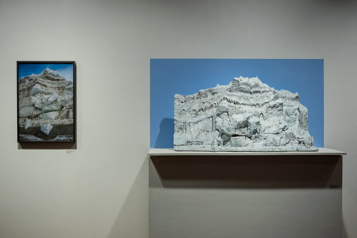 A three-foot-long sculpture of a pressure ridge near the Double Curtain Glacier, next to a photograph of its real-life equivalent. Glazer calls this the "Giant's Face" due to its various protrusions.