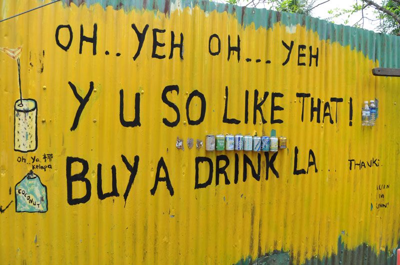 An advertisement in Singlish outside a cafe on Pulau Ubin.