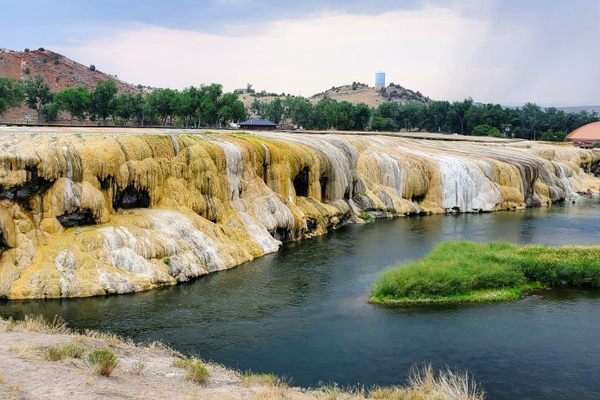The colorful travertine Mineral Terrace, as seen from the Swinging Bridge.