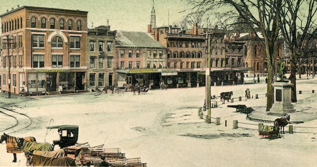 A colorized postcard of Main Street in Keene, New Hampshire, circa 1900.