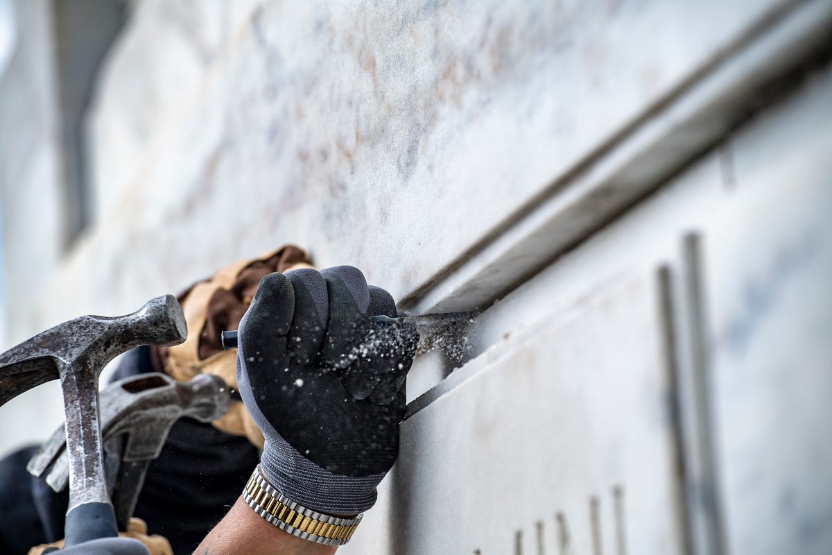 The box was tucked behind the cornerstone, protected—the team hoped—from the elements.