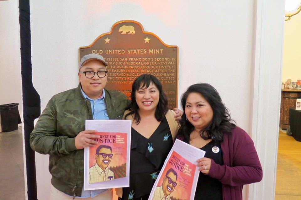 (L-R) Andre Sibayan, Gayle Romasanta, and Dawn B. Mabalon stand with prints of the book cover.