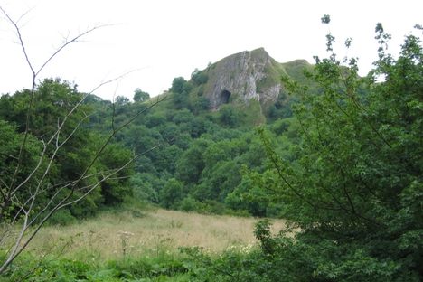 Thor's Cave seen from the Manifold Valley floor