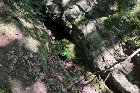 An empty vein between two rocks that was once rich with iron ore.