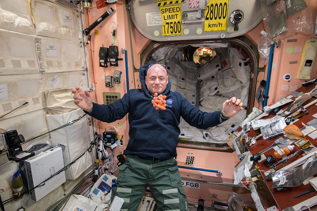 Fresh carrots float in front of Kelly, April 19, 2015.