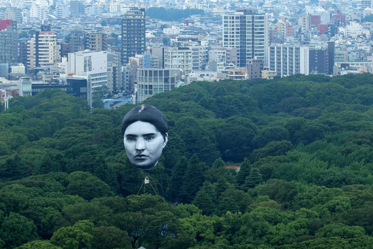 A hot air balloon created by Japanese art group mé floats over Tokyo's Yoyogi Park on July 16, 2021, as part of a project called <em>Masayume</em>, a Japanese word for a dream that becomes reality. 