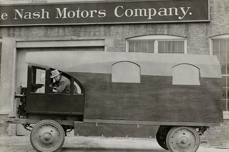 Charles Kellogg with his van, The Travel Log.
