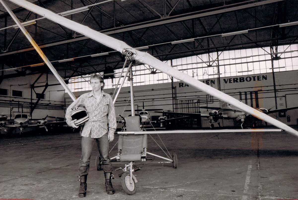 Zdarsky and his homemade power hang-glider—made from scavenged scrap metal, a wheelbarrow, an engine, and a propeller—after he used it to fly to freedom in 1984.