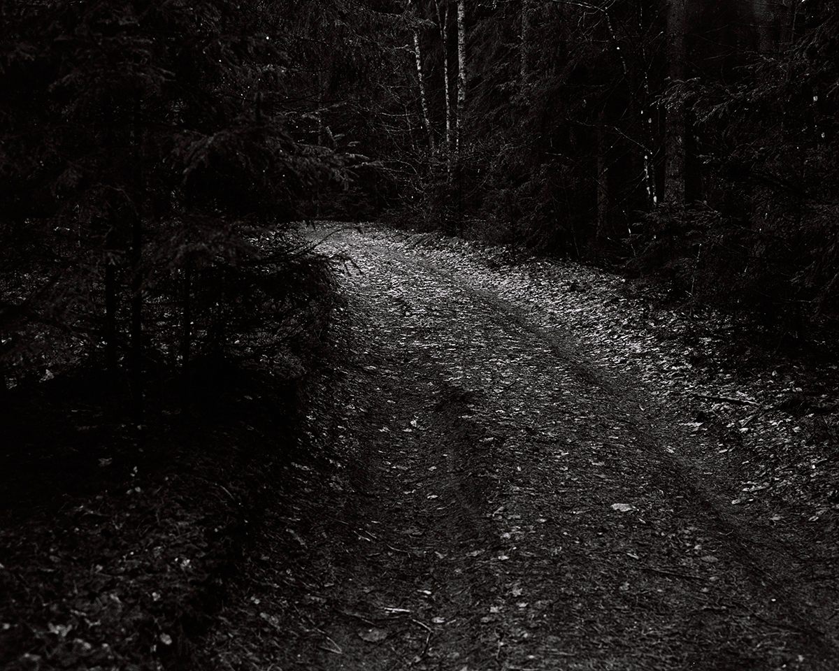 According to photographer Siarhiek Leskiec, healers told him a story of a mother who had lost all her children as infants. She was told to go to the road and ask the first man she met to be godfather. She complied, the healers said, and her next child survived.