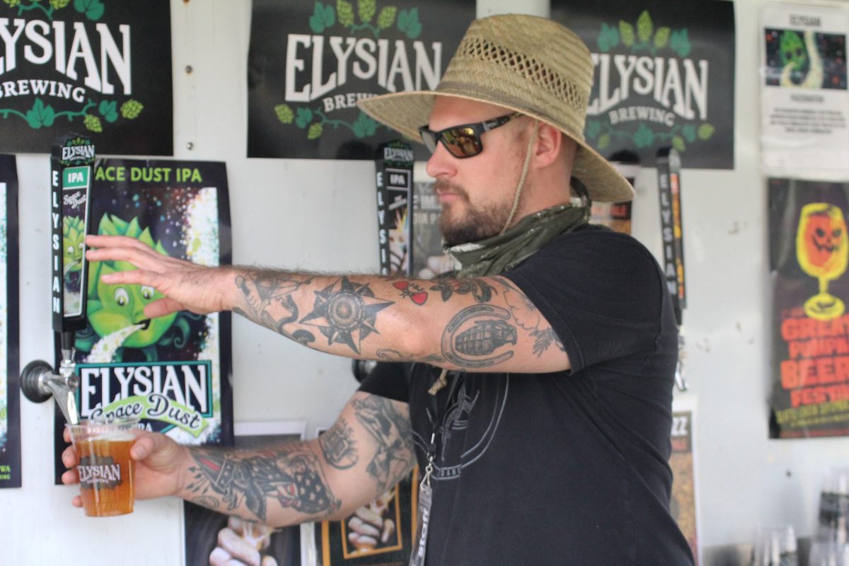 Staff served Space Dust IPA in the Elysian Fields beer garden