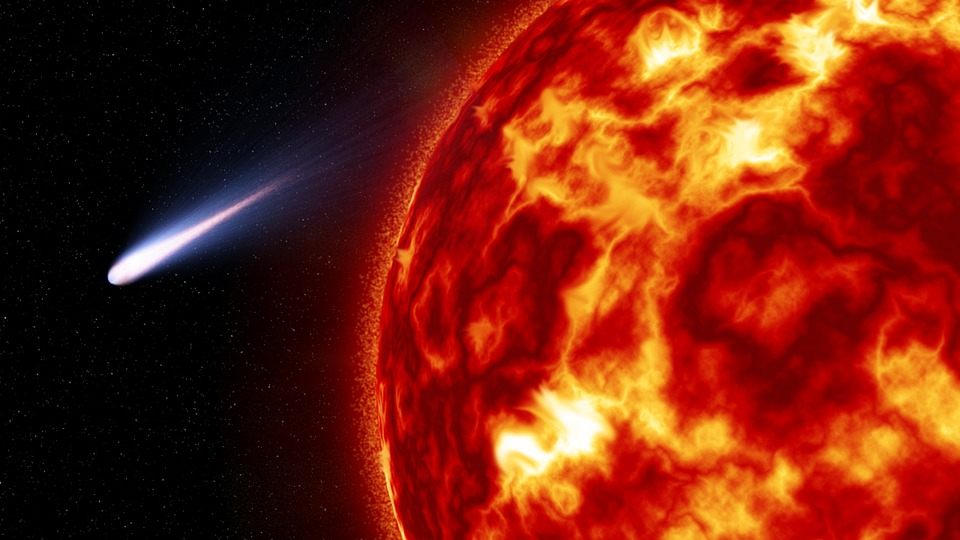 An illustration of a comet passing close to the sun.