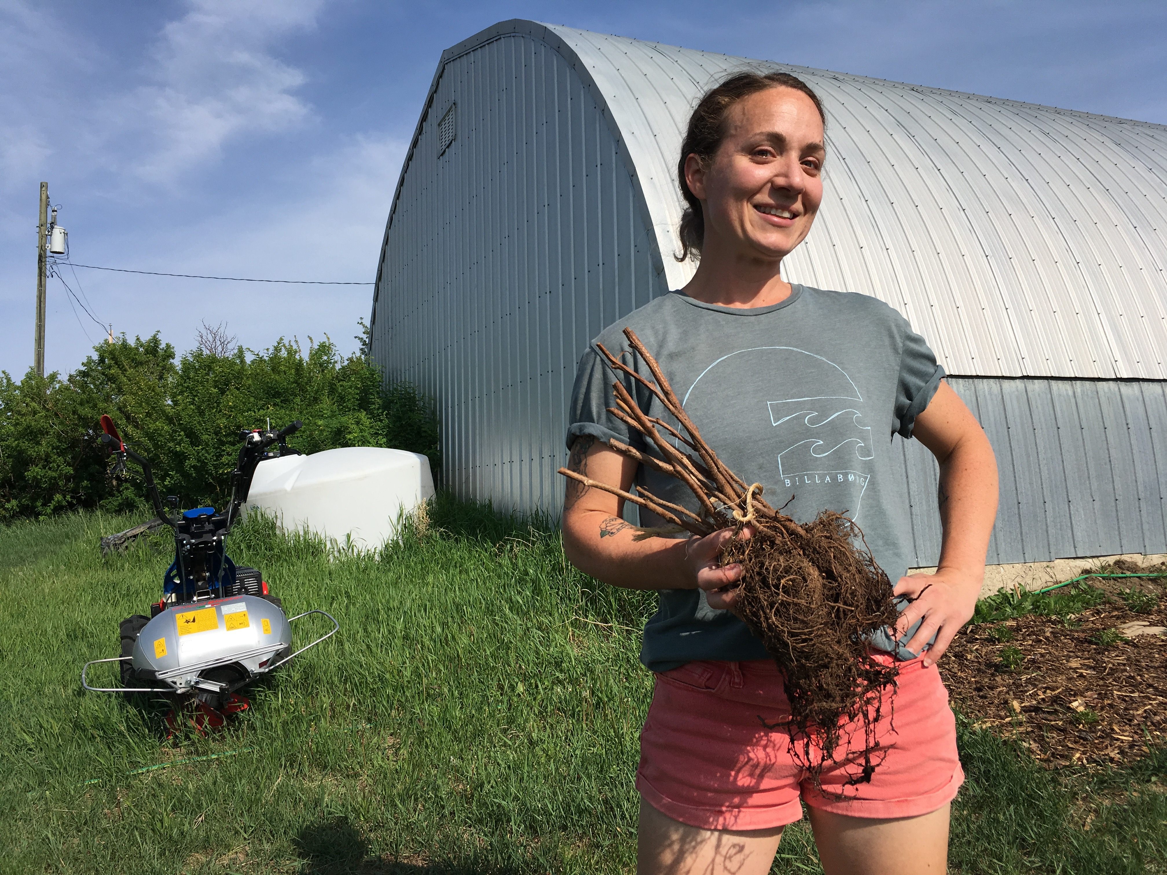 Sarah Adams and a rescued plant.