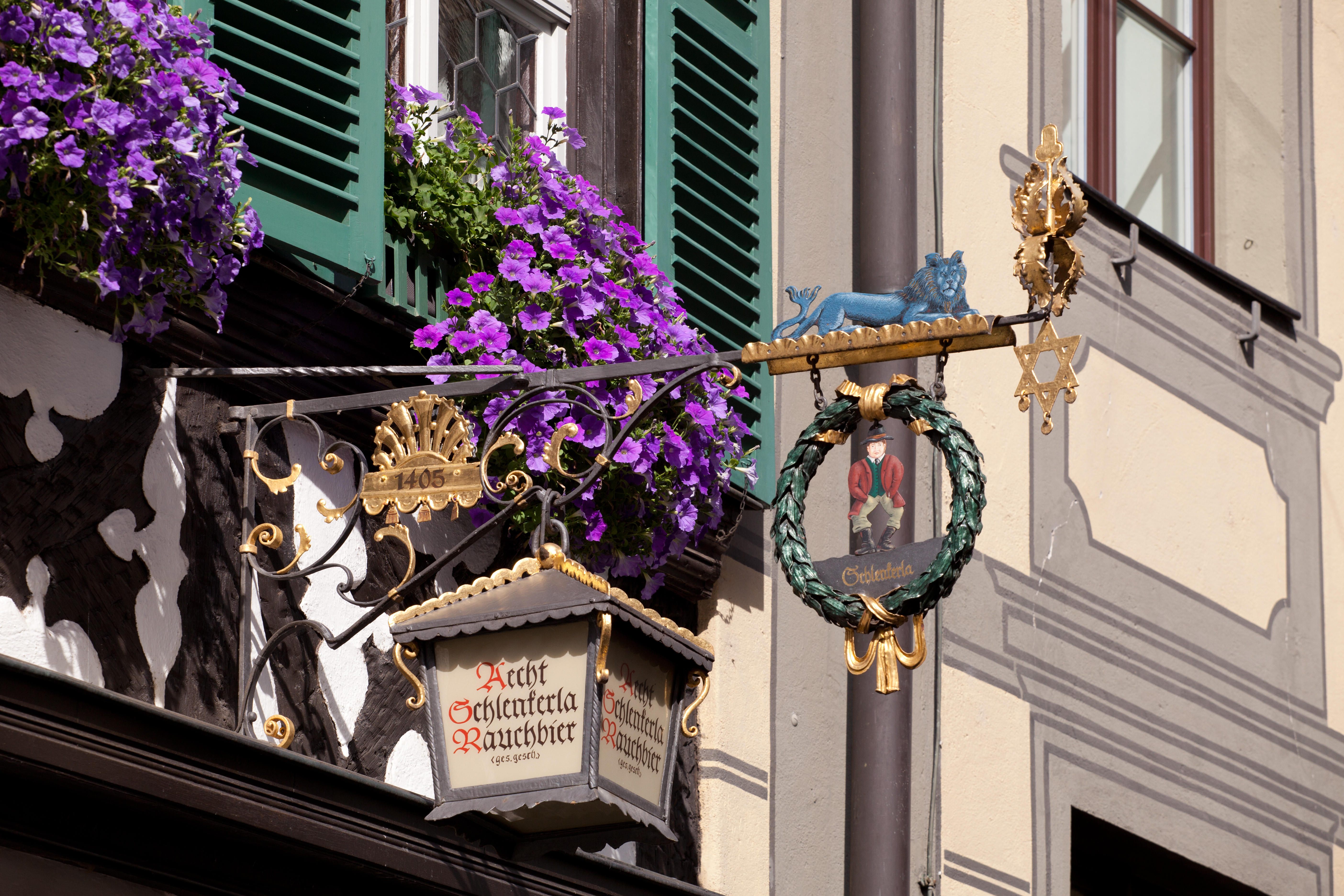  Signs outside a tavern in Bamberg, Germany. 