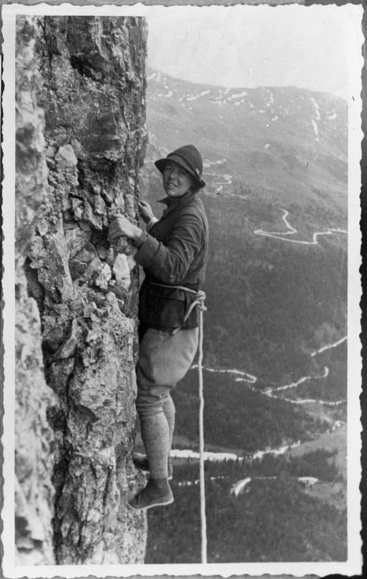 Christine L. Reid rock climbing, 1936.