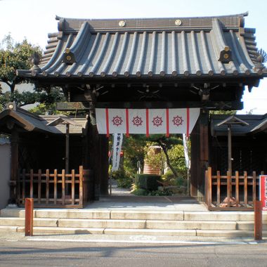 The entrance gate.