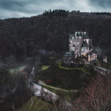 Emerging from the wintry fog in all its grandeur, this 80-room castle has remained in the same family for 33 generations