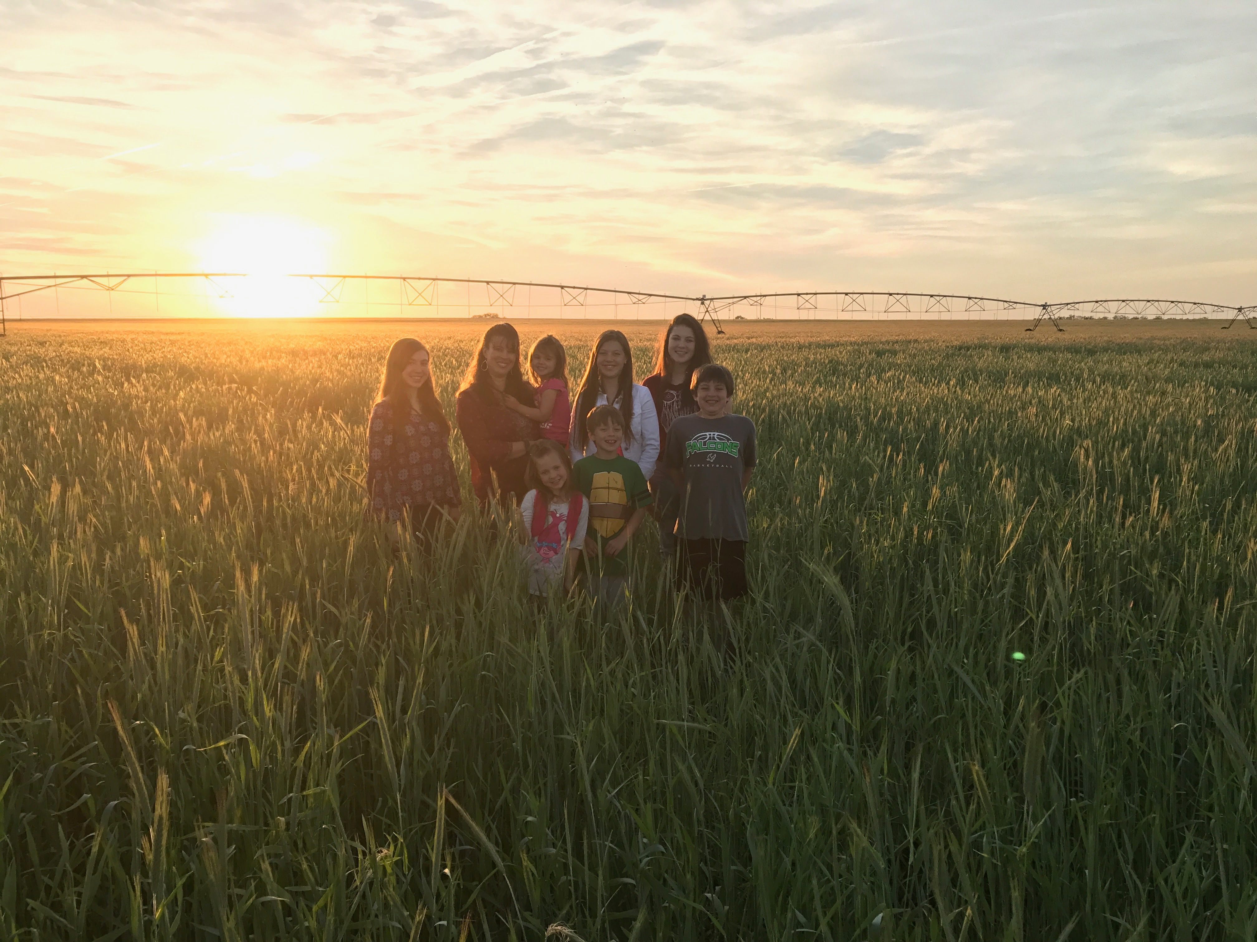 The Hunnicutt family poses on their farm.