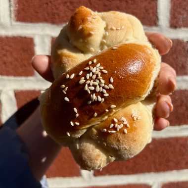 The Famous Bun is a lightly sweet bun with a texture akin to challah.