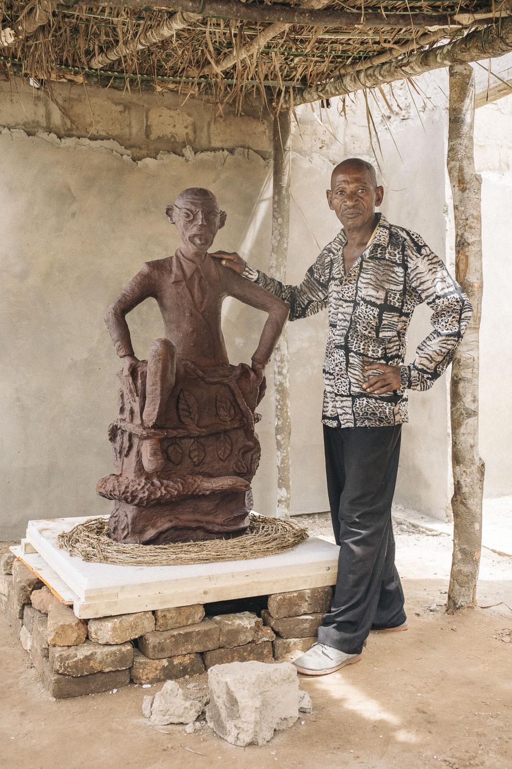 CATPC artist Jeremie Mabiala and his sculpture <em>The Art Collector</em> in the White Cube.