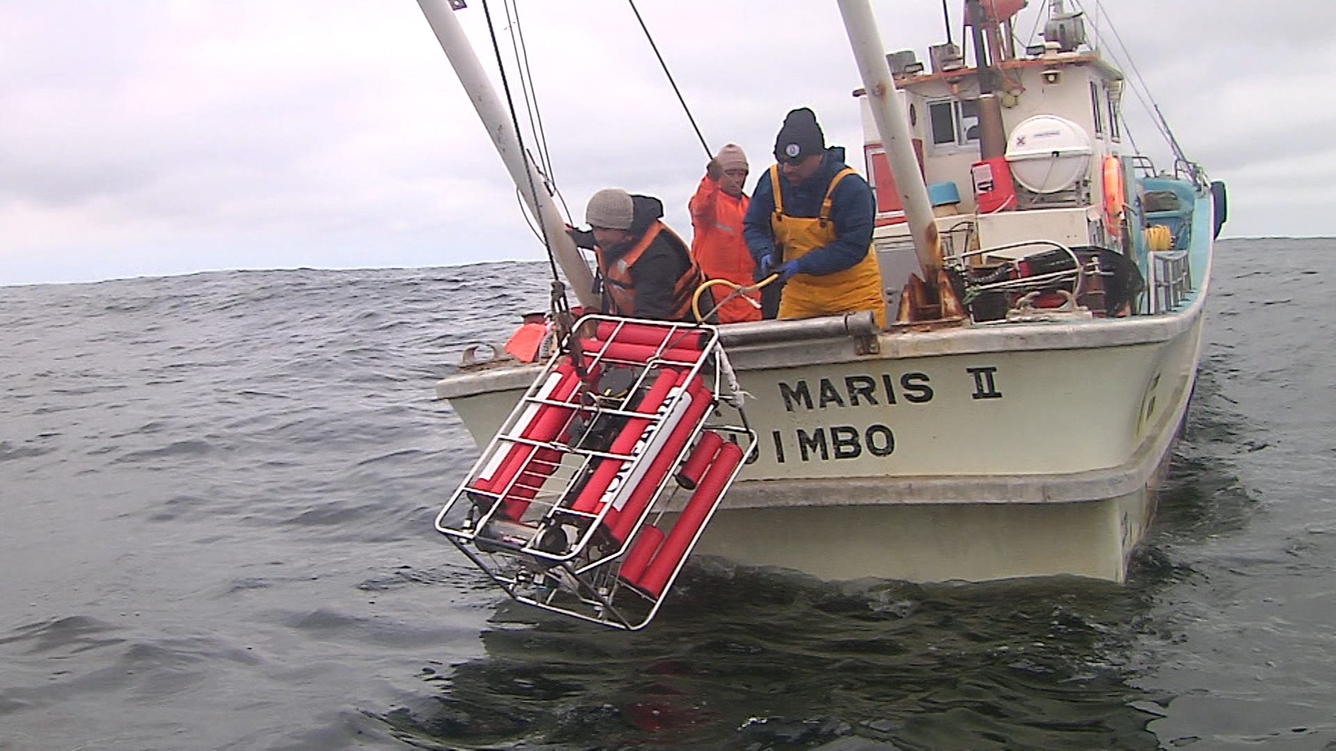 Chilean researchers prepare an ROV to visit the wreck of <em>SS Itata</em>. 