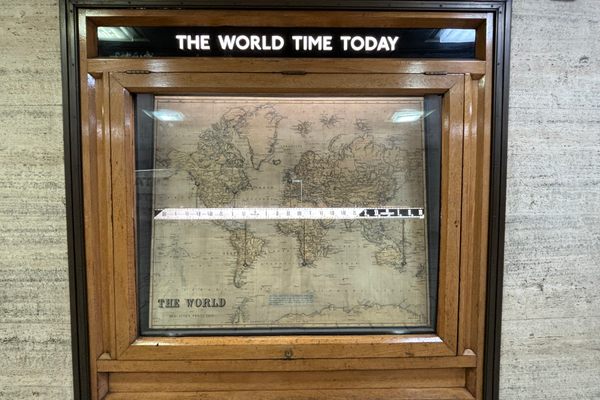 This unusual linear clock shows the time all around the world.