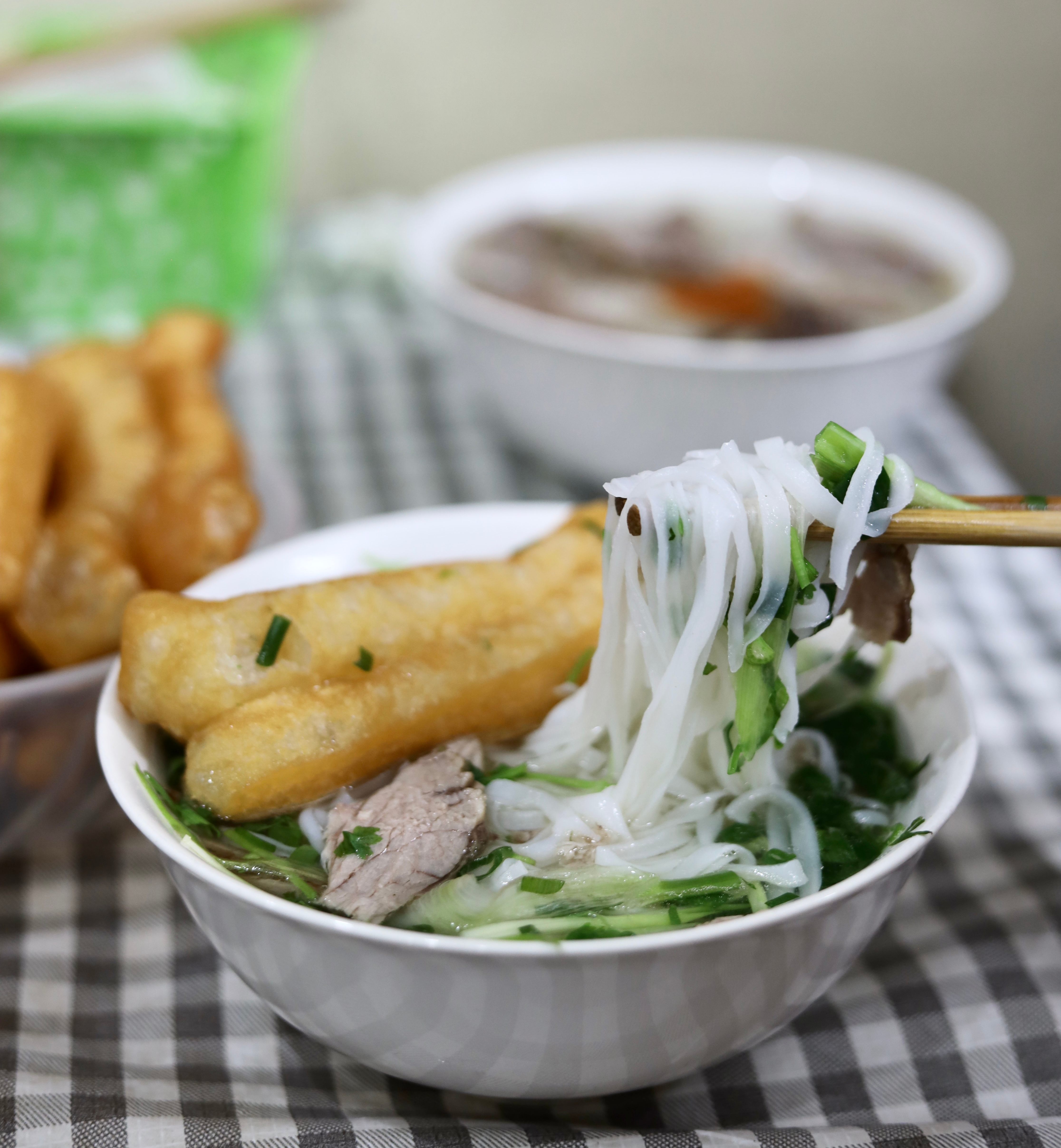 The broth of northern-style phở is made by simmering beef bones for many hours.