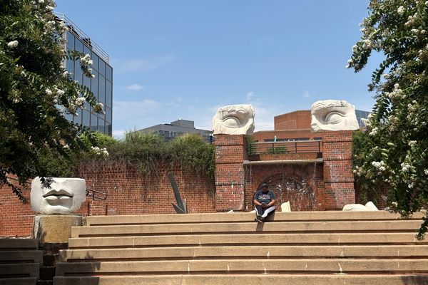 Fragmented marble eyes and enormous lips peer over the terraces of Promenade Classique.