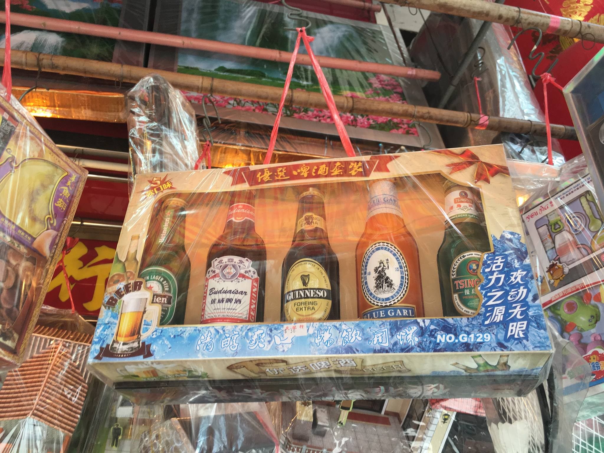 A selection of "ghost beers" on offer in Hong Kong's Sai Ying Pun district. It is now common to find paper effigies of products typical of a globalized society. 