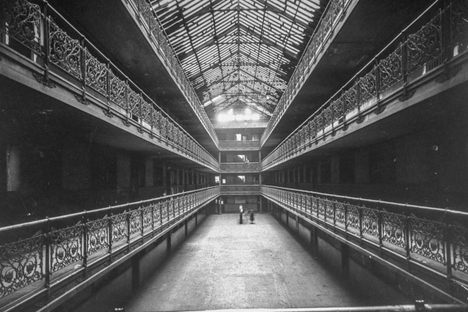 October 1951: The inner court with a glass roof is a feature of each wing of the U-shaped Mecca apartment building. 