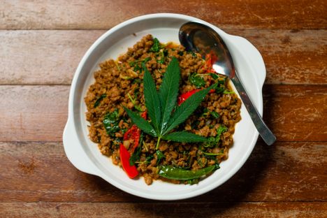 A stir-fry of  minced pork, holy basil, and dried marijuana leaves at Ban Lao Reung, the first restaurant in Thailand to cook with the ingredient.