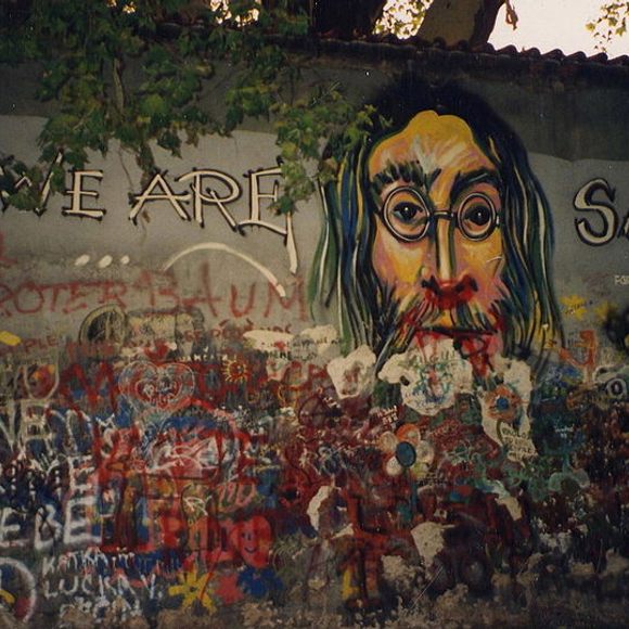 What is the story behind the Lennon Wall in Prague?