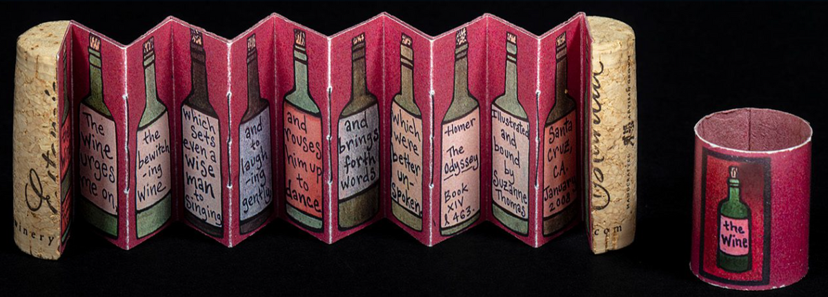 A book made out of a cork, with a stanza from Homer inside.