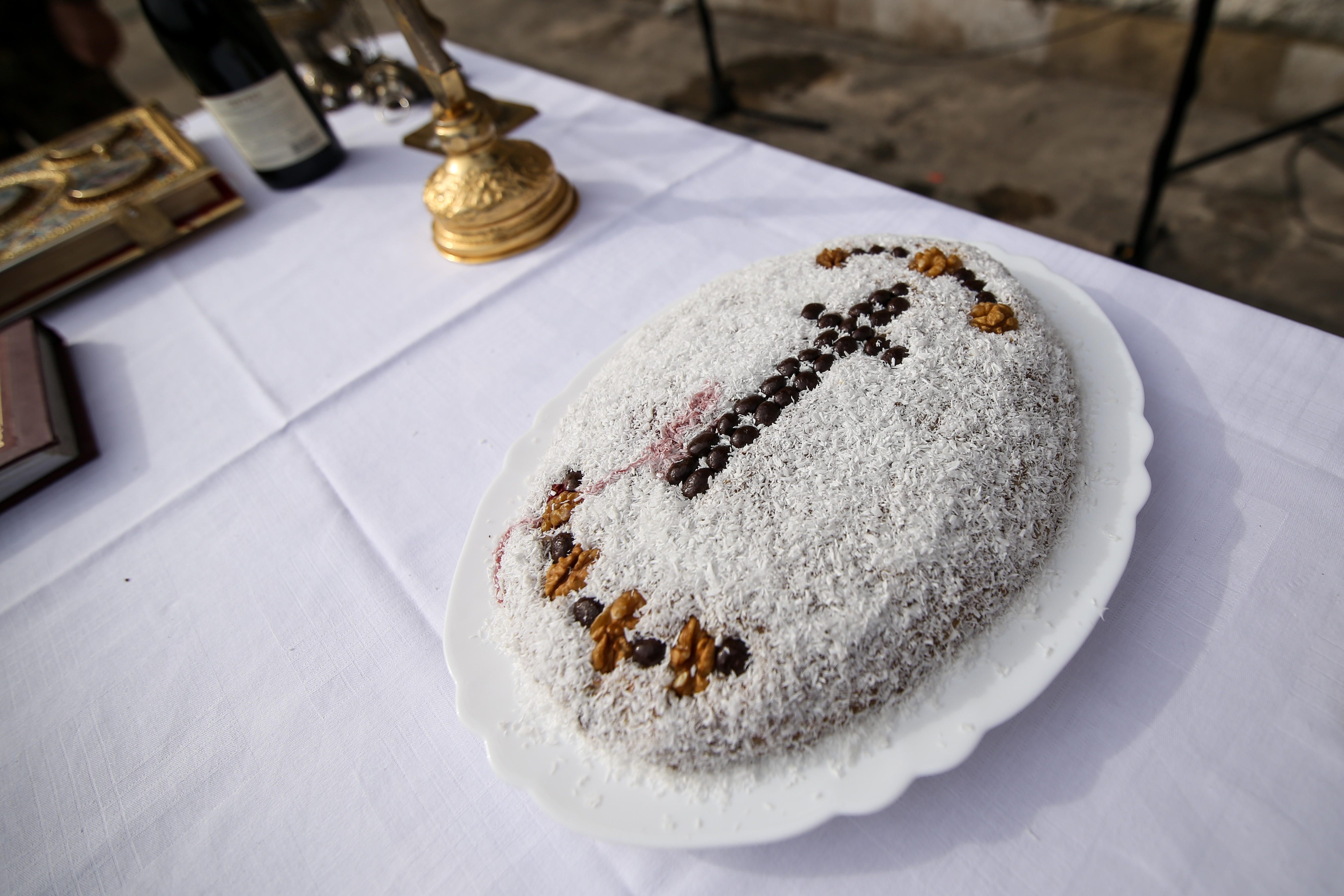 The dish's name has many spelling variations: Here, Romanian <em>coliva</em>.