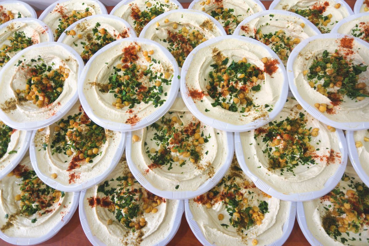 Plates of hummus piled up in Gaza.