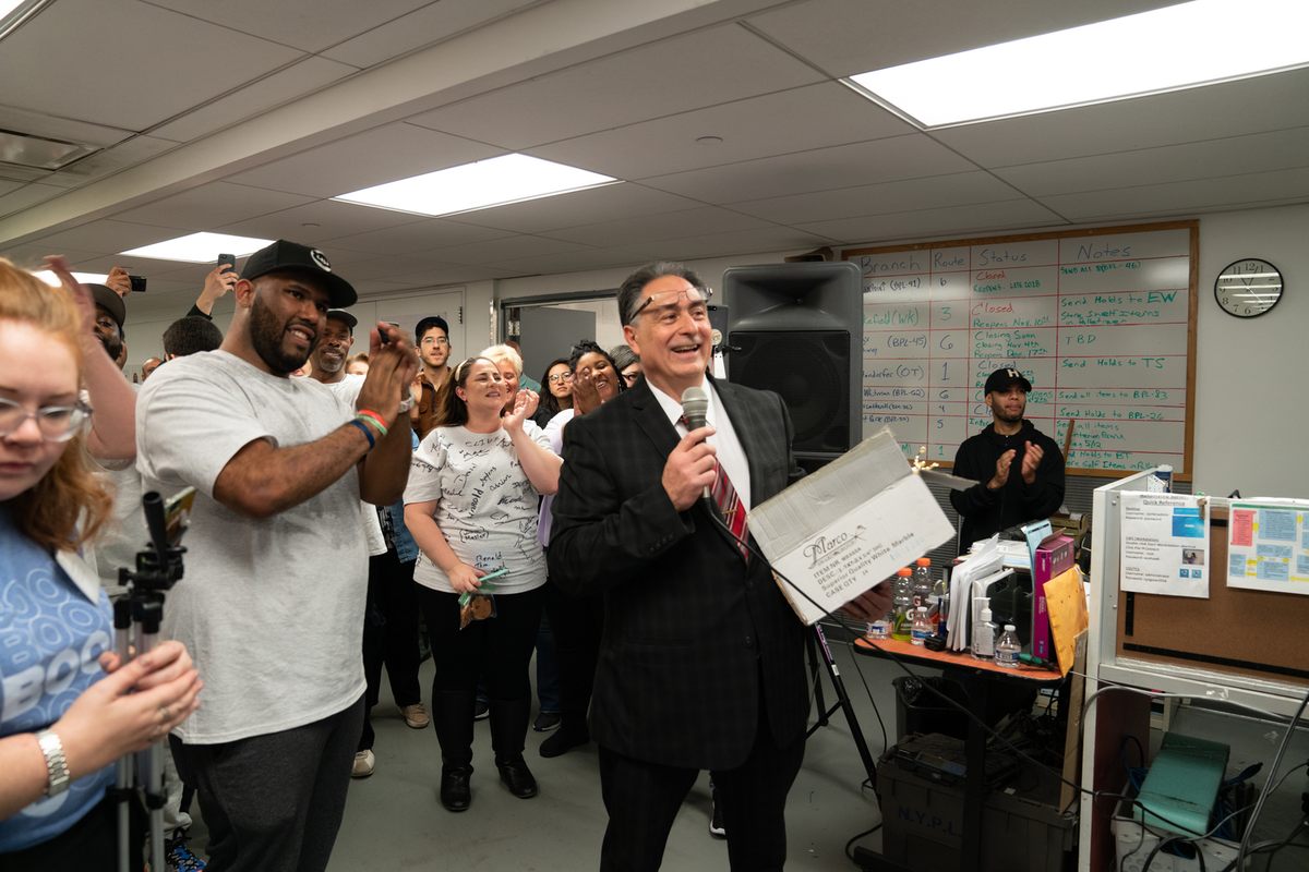BookOps Sorter Michael Genao (left) and Deputy Director of Logistics Sal Magaddino (right).