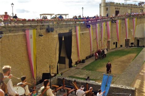 The wooden benches on the lower left are special benches for loading and firing crossbows.