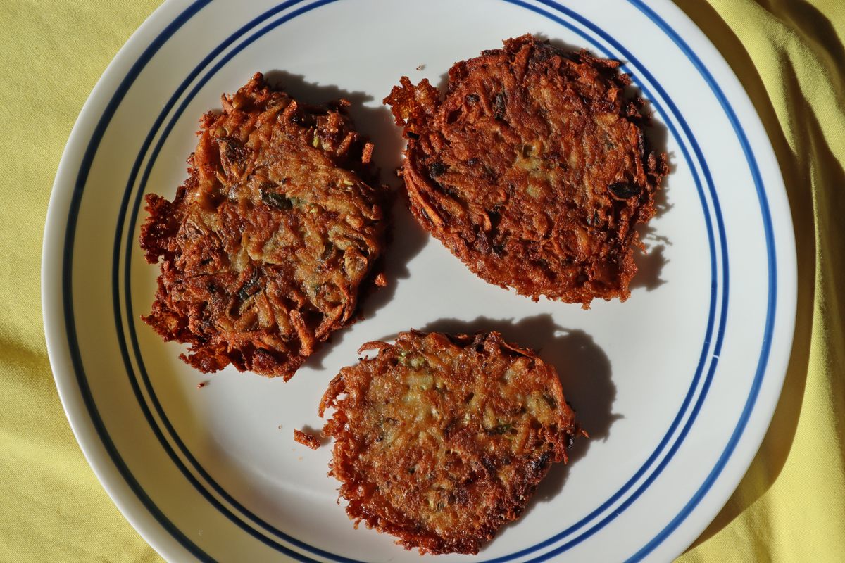 Twitty's Louisiana-style latkes reflect the contributions of Black cooks to Southern Jewish cuisine.