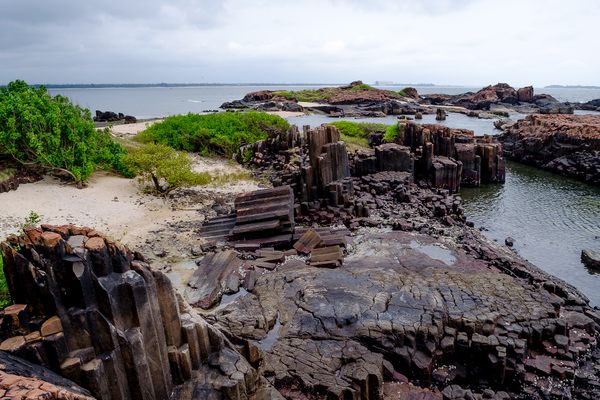 A beach on the island with distinctive rock formations.